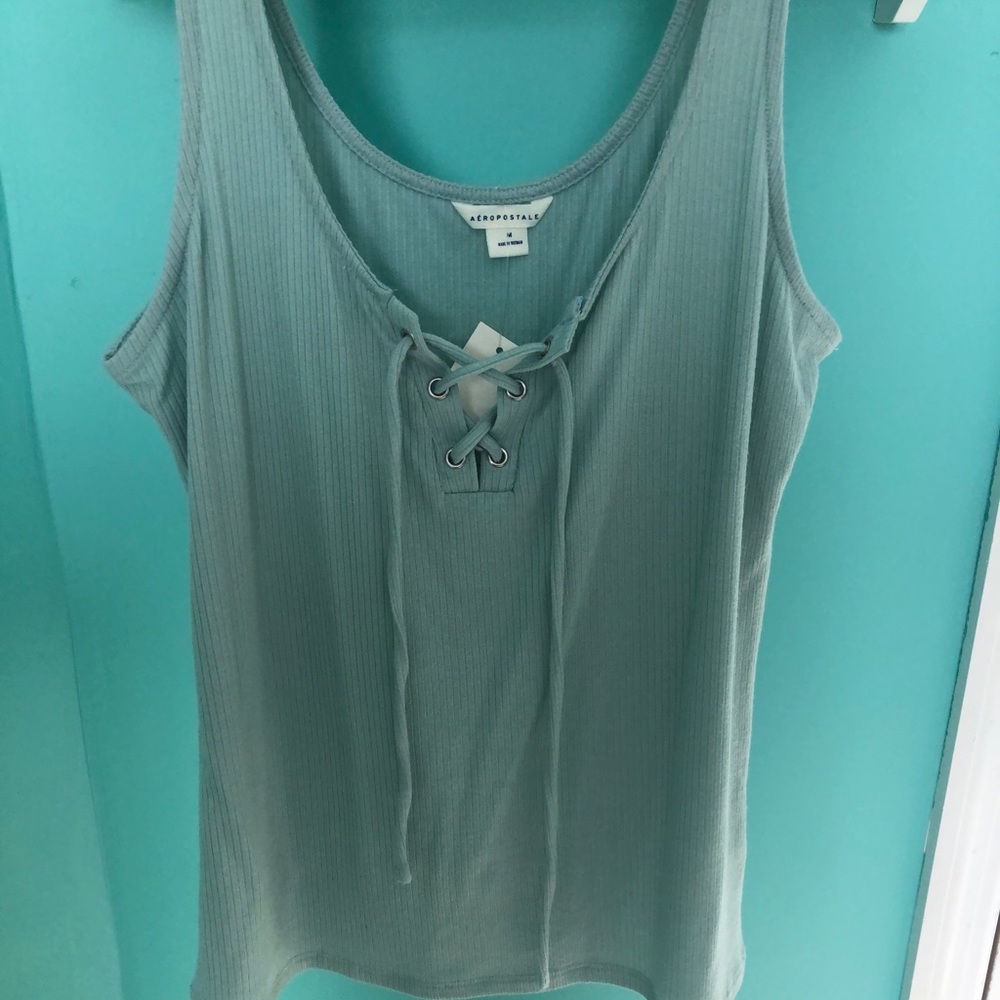 Green/blue top with tie up front